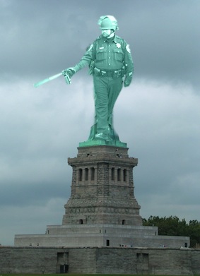 pepper-spraying-cop-statue-of-liberty